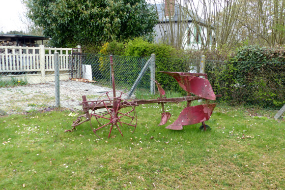Charrue à versoir réversible