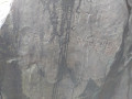 Can you find the carving in Millican Dalton's Cave?
