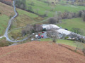 Cars negotiating the Devil's Elbow at Keskadale Farm