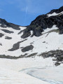 Frozen blue lake (view towards the Col de Couillate)