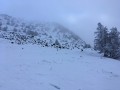 L'abord du sommet dans la brume