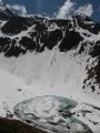 Le Lac de la Sitre pris dans la glace et la neige