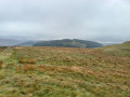 Mabbin Crag ascend through the trees centre left and then up the wide grassy break