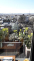 Montmartre, à droite le cimetière, en arrière plan, la tour Eiffel.