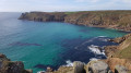 Nanjizal Cove and Longships lighthouse far away