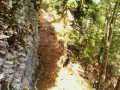 Section running alongside a rock face