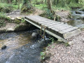 Passerelle avec une roue à eau