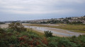 Path overlooking the Gannel Estuary at low tide