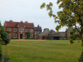 The remains of Claxton Castle in front of Claxton Manor
