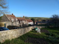 View of East dean, pub on the left