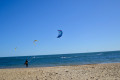 View of kite surfers at Brighton Beach