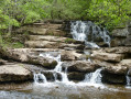 Waterfall as East Gill joins the River Swale near Keld